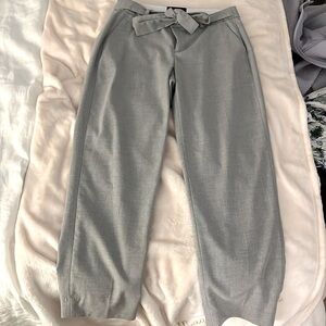 Banana Republic grey and white herringbone tie-waist work pants.